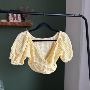 Women’s pale pastel yellow cropped wrap top with puff sleeve size medium
